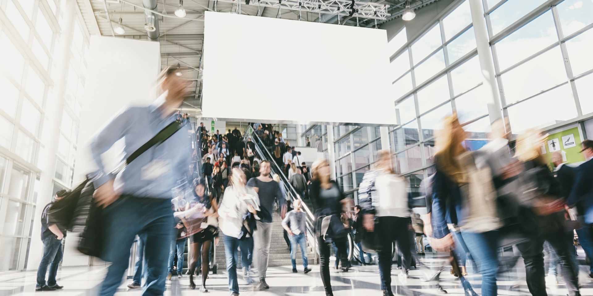 Canva - crowd of anonymous blurred busin